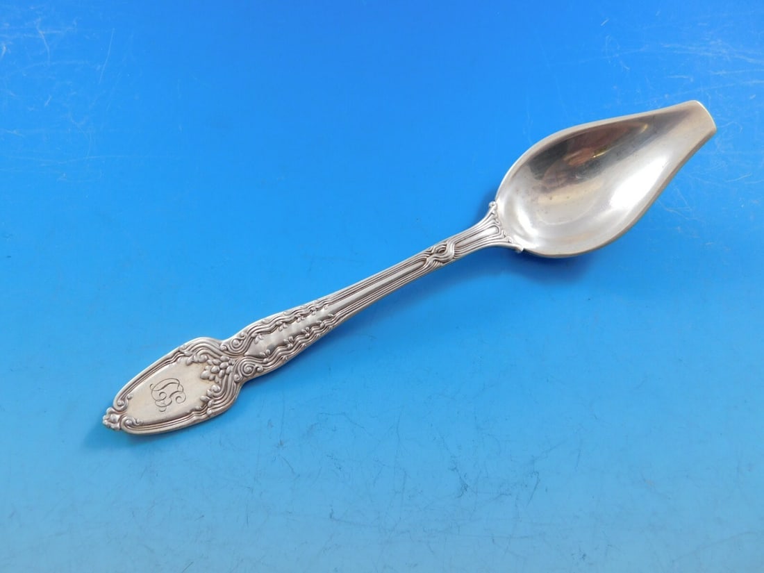 Tiffany & Co. Broom Corn Sterling Silver Melon Spoon 5 3/4 Inch: Tiffany & Co. Broom Corn Sterling Silver Melon Spoon 5 3/4 Inch This stunning melon spoon from Tiffany & Co. showcases the exquisite Broom Corn pattern. Crafted from high-quality sterling silver, it f