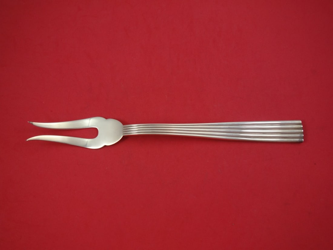 Buccellati Tiber Sterling Silver 2-Tine Vegetable Serving Fork 10 3/4": Buccellati Tiber Sterling Silver 2-Tine Vegetable Serving Fork 10 3/4" This elegant Tiber by Buccellati vegetable serving fork features a 2-tine design and is crafted from high-quality sterling silver