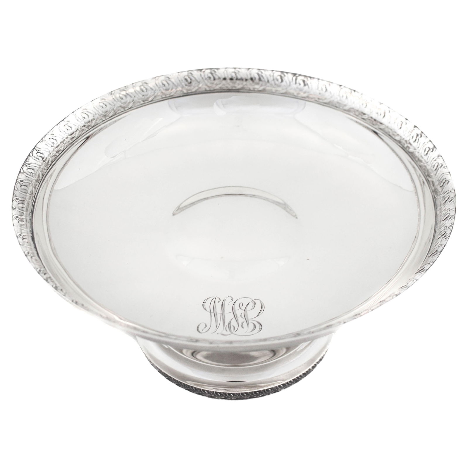 Tiffany & Co Sterling Silver Footed Bowl Floral Motif 1930s: Tiffany & Co Sterling Silver Footed Bowl Floral Motif 1930s This exquisite footed bowl from Tiffany and Co. showcases the elegance of sterling silver craftsmanship. Designed in the 1930s, it features