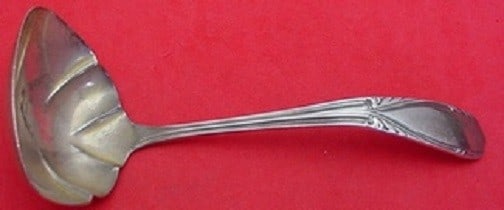 Manchester Polly Lawton Sterling Silver Gravy Ladle 5 3/4": Manchester Polly Lawton Sterling Silver Gravy Ladle 5 3/4" This exquisite gravy ladle features the elegant Polly Lawton pattern by Manchester, crafted from high-quality sterling silver. Measuring 5 3/