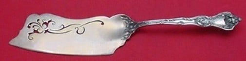 Reed Barton Intaglio Sterling Silver Gold Washed Pierced Ice Cream Slice 12 1/2 Inch: Reed Barton Intaglio Sterling Silver Gold Washed Pierced Ice Cream Slice 12 1/2 Inch This sterling silver serving piece is an ice cream slice featuring the Intaglio pattern by Reed & Barton. The slice