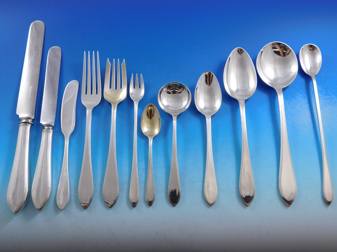 Tiffany & Co Reeded Edge Sterling Silver Flatware Set 101 Pieces: Tiffany & Co Reeded Edge Sterling Silver Flatware Set 101 Pieces This stunning Reeded Edge flatware set from Tiffany & Co. is crafted from high-quality sterling silver, featuring a classic Queen Anne