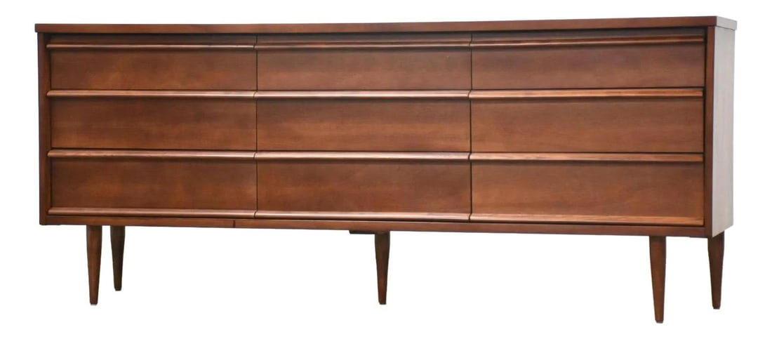 1960s Bassett Mid Century Modern Walnut Dresser 9 Drawers: 1960s Bassett Mid Century Modern Walnut Dresser 9 Drawers This mid-century modern dresser, crafted by Bassett Furniture, features nine spacious drawers with elegantly sculpted pulls. Professionally re