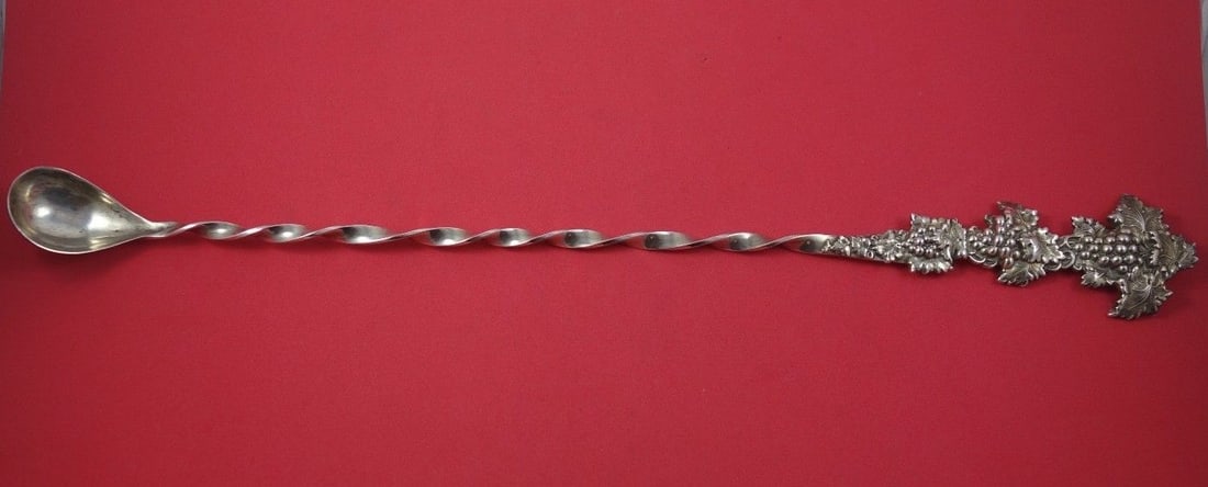 Fradley & Co. Sterling Silver Claret Ladle 18 1/2 Twisted Handle Grapes Leaves: Fradley & Co. Sterling Silver Claret Ladle 18 1/2 Twisted Handle Grapes Leaves This exquisite claret ladle by Fradley & Co. showcases a beautifully crafted twist handle adorned with intricate grape an