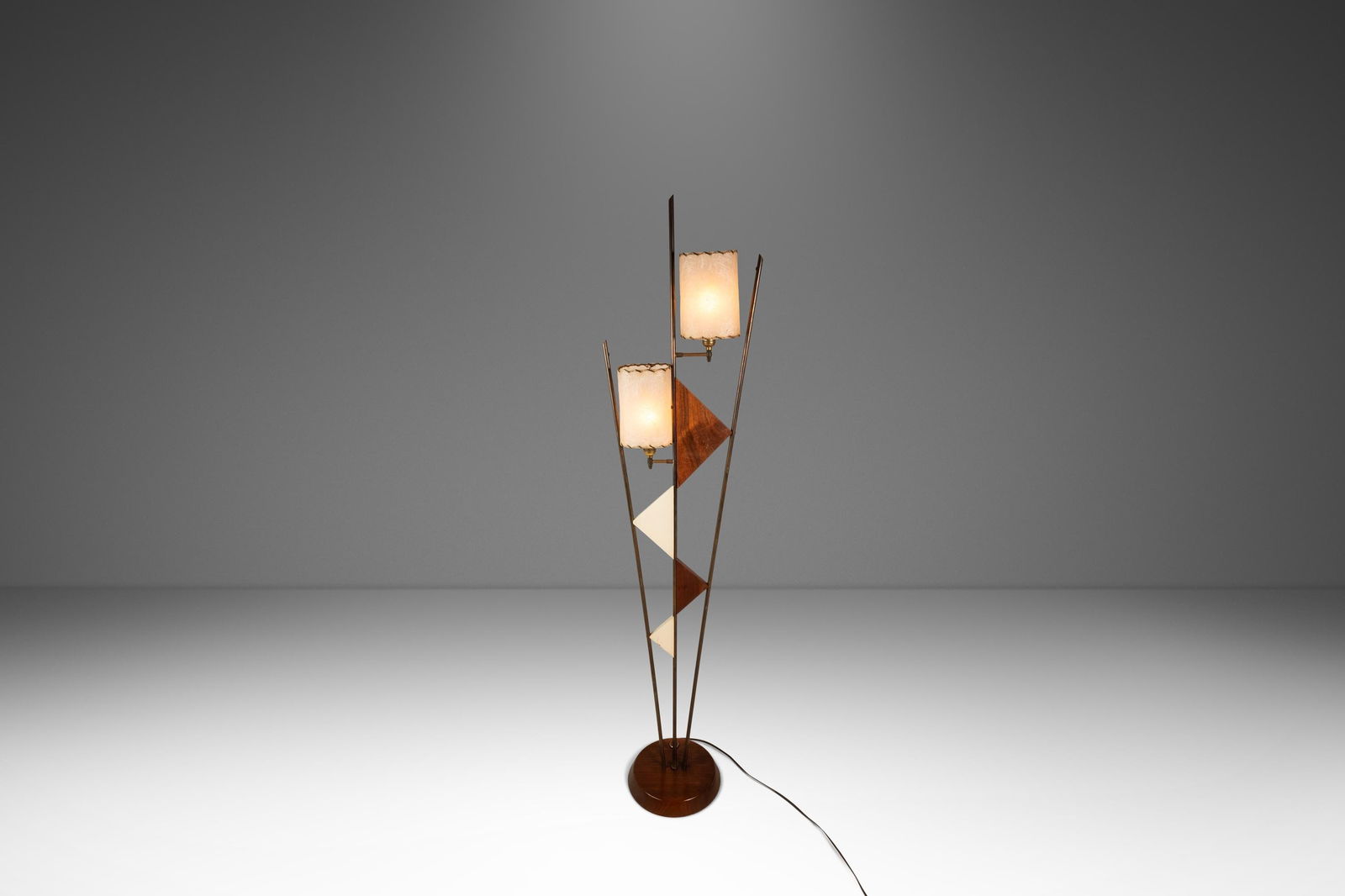 Custom Walnut and Brass Geometric Floor Lamp Atomic Era USA Circa 1950s: Custom Walnut and Brass Geometric Floor Lamp Atomic Era USA Circa 1950s This custom-made floor lamp from the 1950s combines Mid-Century Modern, Art Deco, and Atomic Era influences. Crafted in the USA,