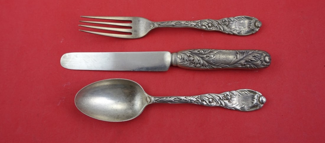 Tiffany & Co Chrysanthemum Sterling Silver 3-Pc Junior Set 1898: Tiffany & Co Chrysanthemum Sterling Silver 3-Pc Junior Set 1898 This exquisite 3-piece junior set from Tiffany & Co. features the elegant Chrysanthemum pattern, originally designed by Charles Grosjean