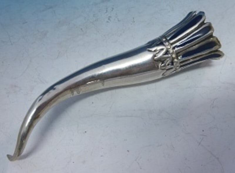 Victorian Silverplate Tussie Mussie Holder with Blue Enamel 5": Victorian Silverplate Tussie Mussie Holder with Blue Enamel 5" This exquisite silverplate tussie mussie posey holder, adorned with dark blue and white enamel, showcases a refined Victorian design. Dat