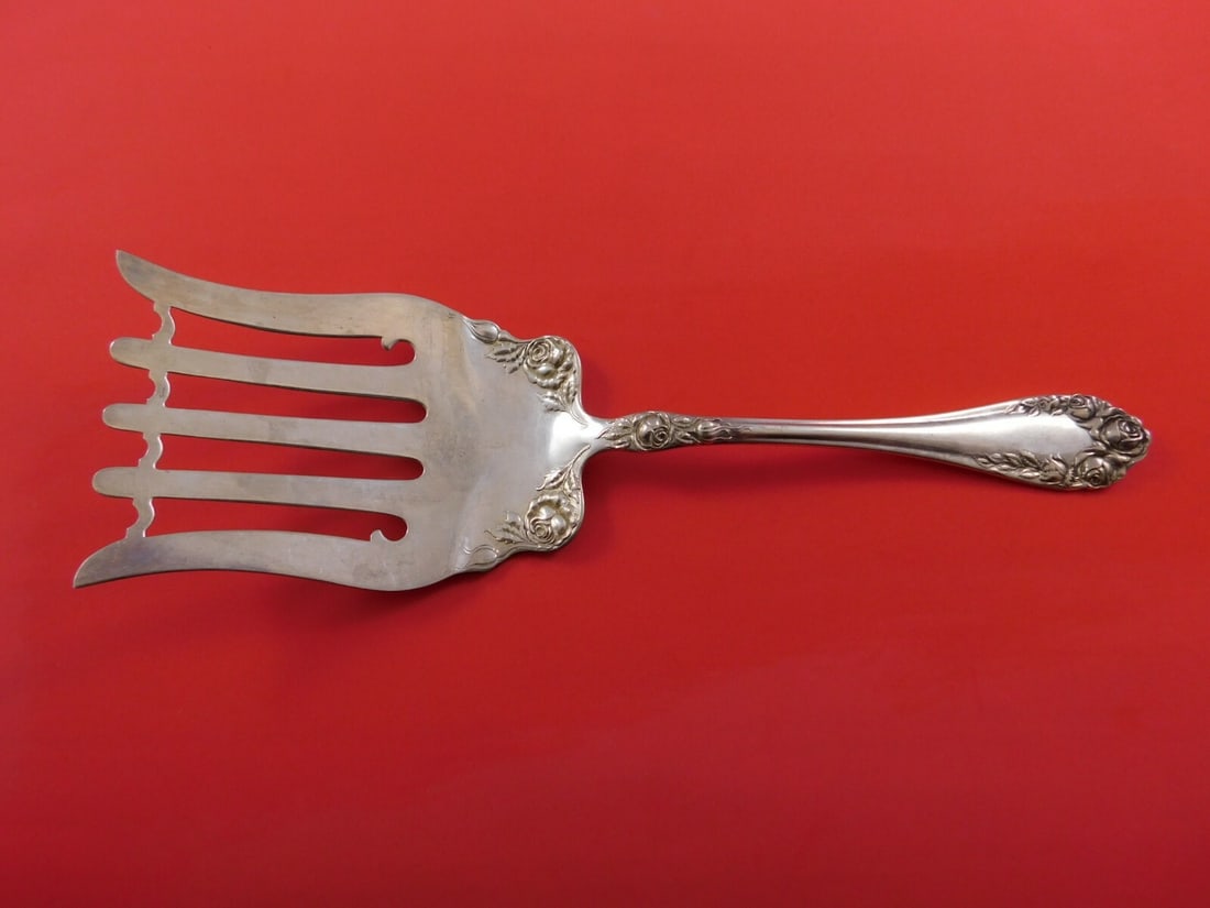 Wallace Rose Sterling Silver Asparagus Fork 9.25 inches: Wallace Rose Sterling Silver Asparagus Fork 9.25 inches This exquisite asparagus fork is a stunning piece from the renowned Wallace brand, crafted in the elegant Rose pattern. Measuring 9 1/4" in leng