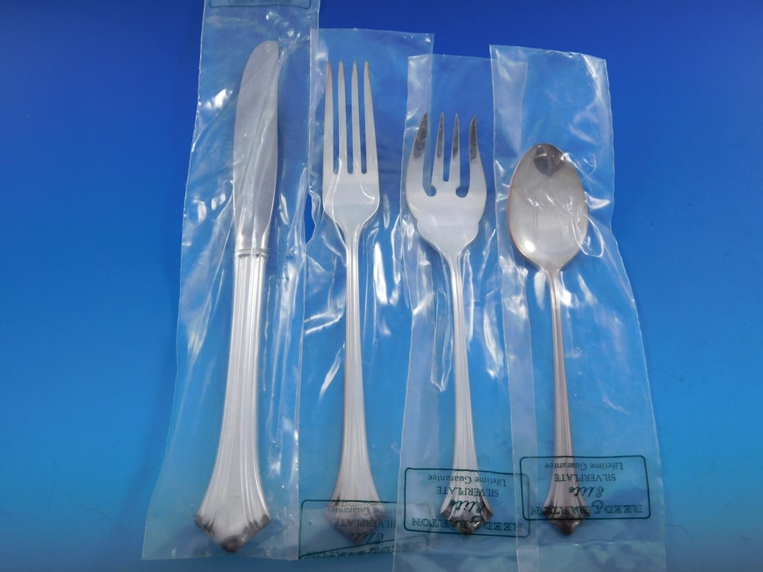 Reed & Barton Parthenon Silverplate Flatware Set 48 Pieces with Vintage Chest: Reed & Barton Parthenon Silverplate Flatware Set 48 Pieces with Vintage Chest Enhance your dining experience with this exquisite Parthenon flatware set by Reed & Barton. This service for twelve includ