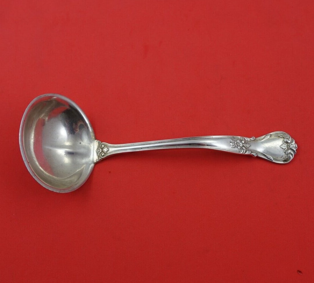 Weidlich Ancestry Sterling Silver Gravy Ladle 6.5 Inch Serving Piece: Weidlich Ancestry Sterling Silver Gravy Ladle 6.5 Inch Serving Piece Add a touch of elegance to your dining experience with this exquisite Sterling Silver Gravy Ladle from the Ancestry pattern by Weid
