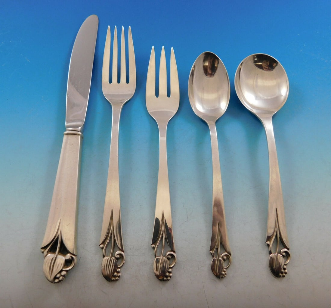 Frank Smith Woodlily Sterling Silver Flatware Set for 12 60 Pieces: Frank Smith Woodlily Sterling Silver Flatware Set for 12 60 Pieces Elevate your dining experience with this exquisite Woodlily flatware set by Frank Smith, crafted in sterling silver. This 60-piece se