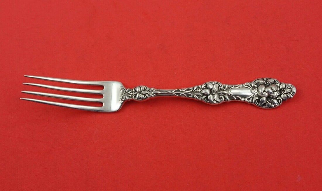 Gorham Old Orange Blossom Sterling Silver Tea Fork 6 1/8": Gorham Old Orange Blossom Sterling Silver Tea Fork 6 1/8" This exquisite tea fork by Alvin / Gorham features the beautiful Old Orange Blossom pattern, crafted from high-quality sterling silver. Measur