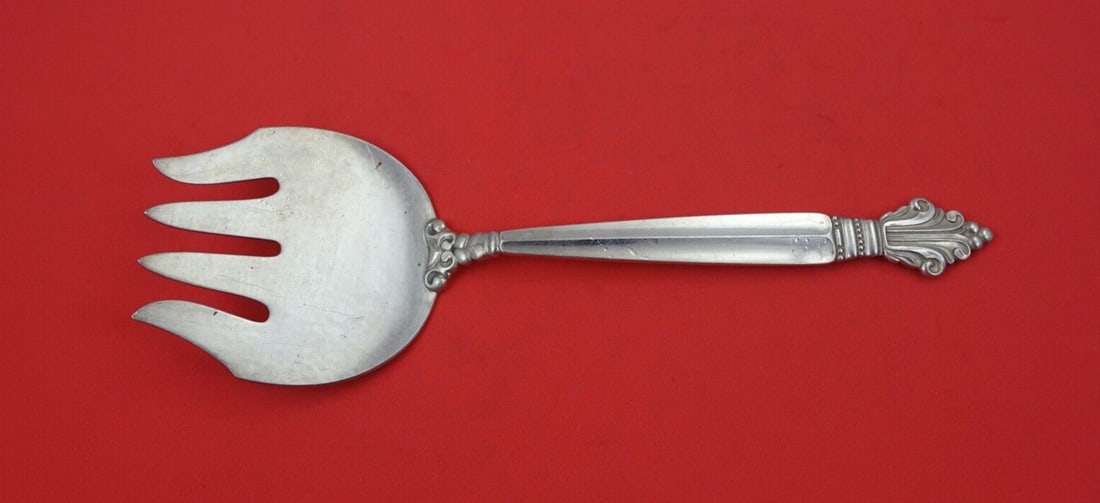 Georg Jensen Acanthus Sterling Silver 4-Tine Fish Serving Fork 9": Georg Jensen Acanthus Sterling Silver 4-Tine Fish Serving Fork 9" This exquisite 4-tine fish serving fork is crafted from sterling silver and features the elegant Acanthus pattern by Georg Jensen. Mea