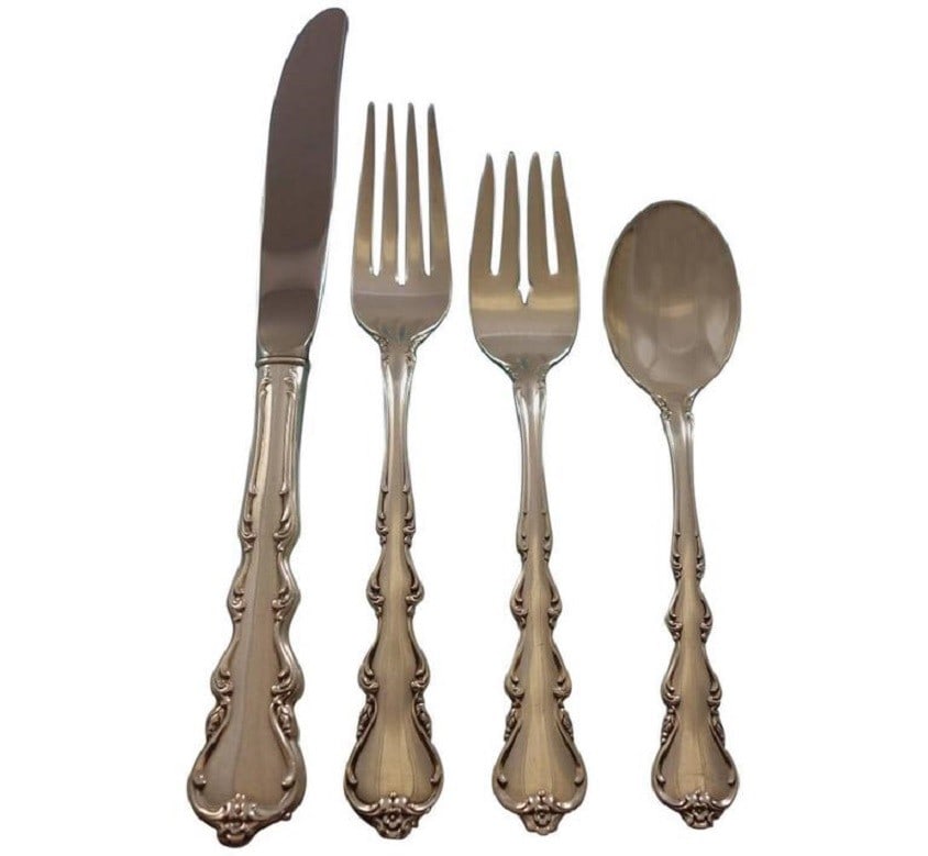 International Sterling Silver Angelique Flatware Set 28 Pieces: International Sterling Silver Angelique Flatware Set 28 Pieces Introducing the exquisite Angelique flatware set by International Silver, a perfect blend of elegance and functionality. This retired pat