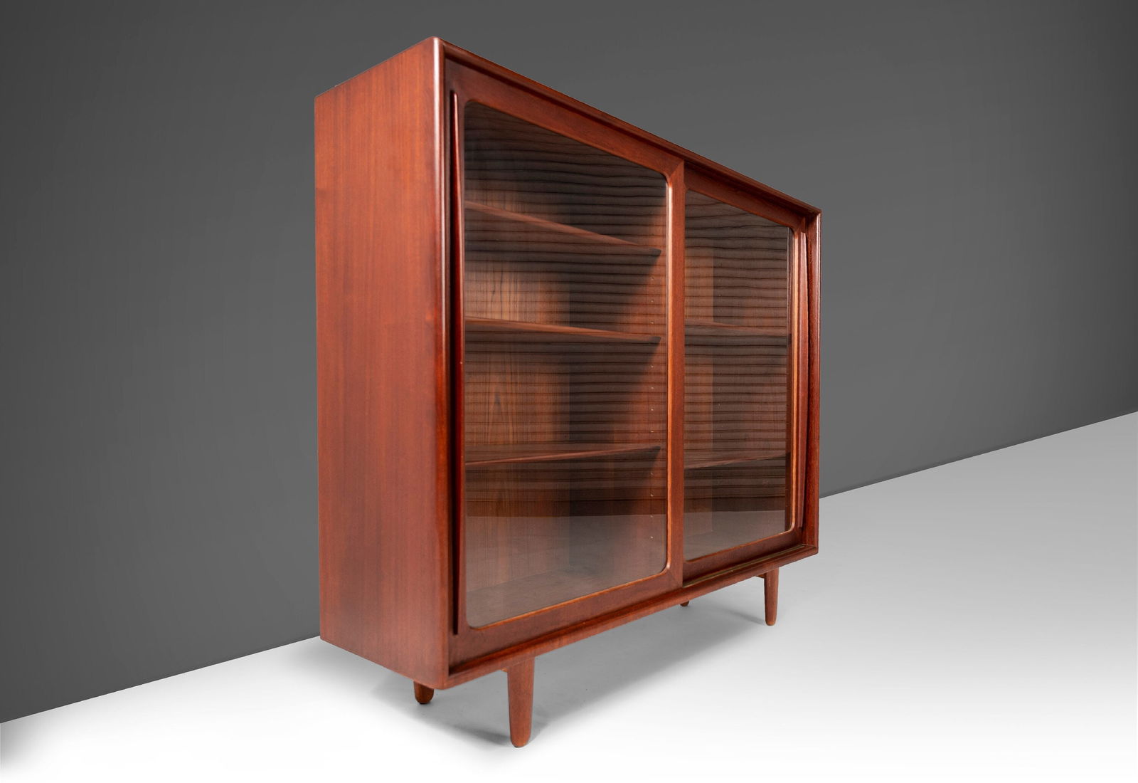 Rare Danish Modern Teak Glass Front Bookcase by Harry Ostergaard 1960s: Rare Danish Modern Teak Glass Front Bookcase by Harry Ostergaard 1960s Discover a truly rare and exceptional Danish Modern Glass Front Bookcase / Display Cabinet designed by Harry Ostergaard in the 19