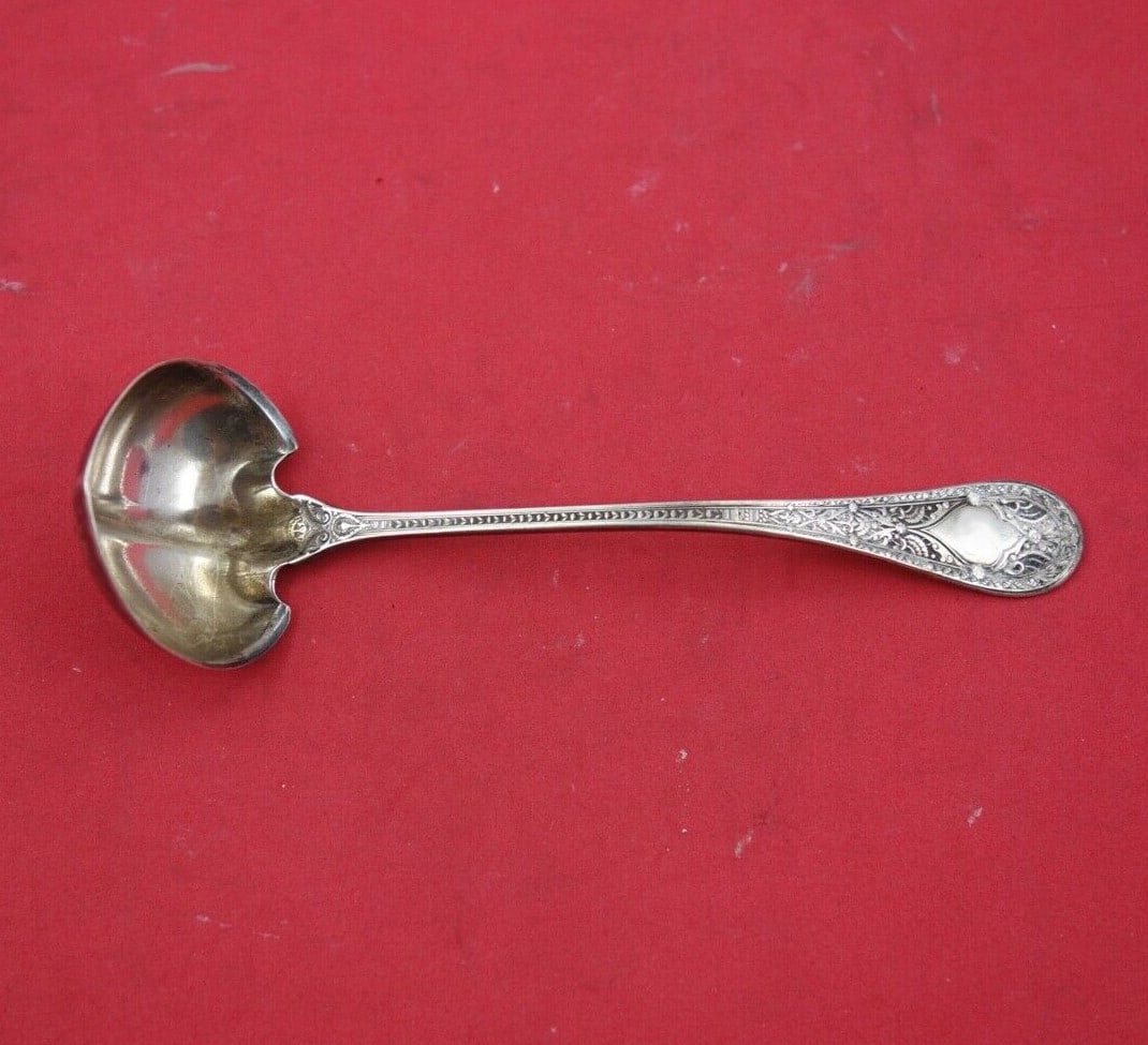 Whiting Persian Sterling Silver Sauce Ladle 5.5 Inches: Whiting Persian Sterling Silver Sauce Ladle 5.5 Inches This exquisite sauce ladle is crafted from sterling silver and features the elegant Persian pattern by Whiting Manufacturing Company. Measuring 5
