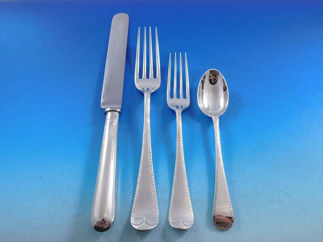 James Robinson Feather Edge Sterling Silver Flatware Set 61 Pieces: James Robinson Feather Edge Sterling Silver Flatware Set 61 Pieces Elevate your dining experience with this exquisite Feather Edge Sterling Silver Flatware Dinner Service, crafted by James Robinson. T