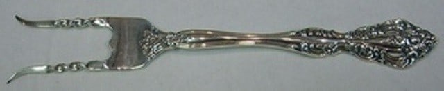 Oneida Michelangelo Sterling Silver Baked Potato Fork Custom 7.5 Inch: Oneida Michelangelo Sterling Silver Baked Potato Fork Custom 7.5 Inch This exquisite baked potato fork is crafted from sterling silver and features the elegant Michelangelo pattern by Oneida. Measurin