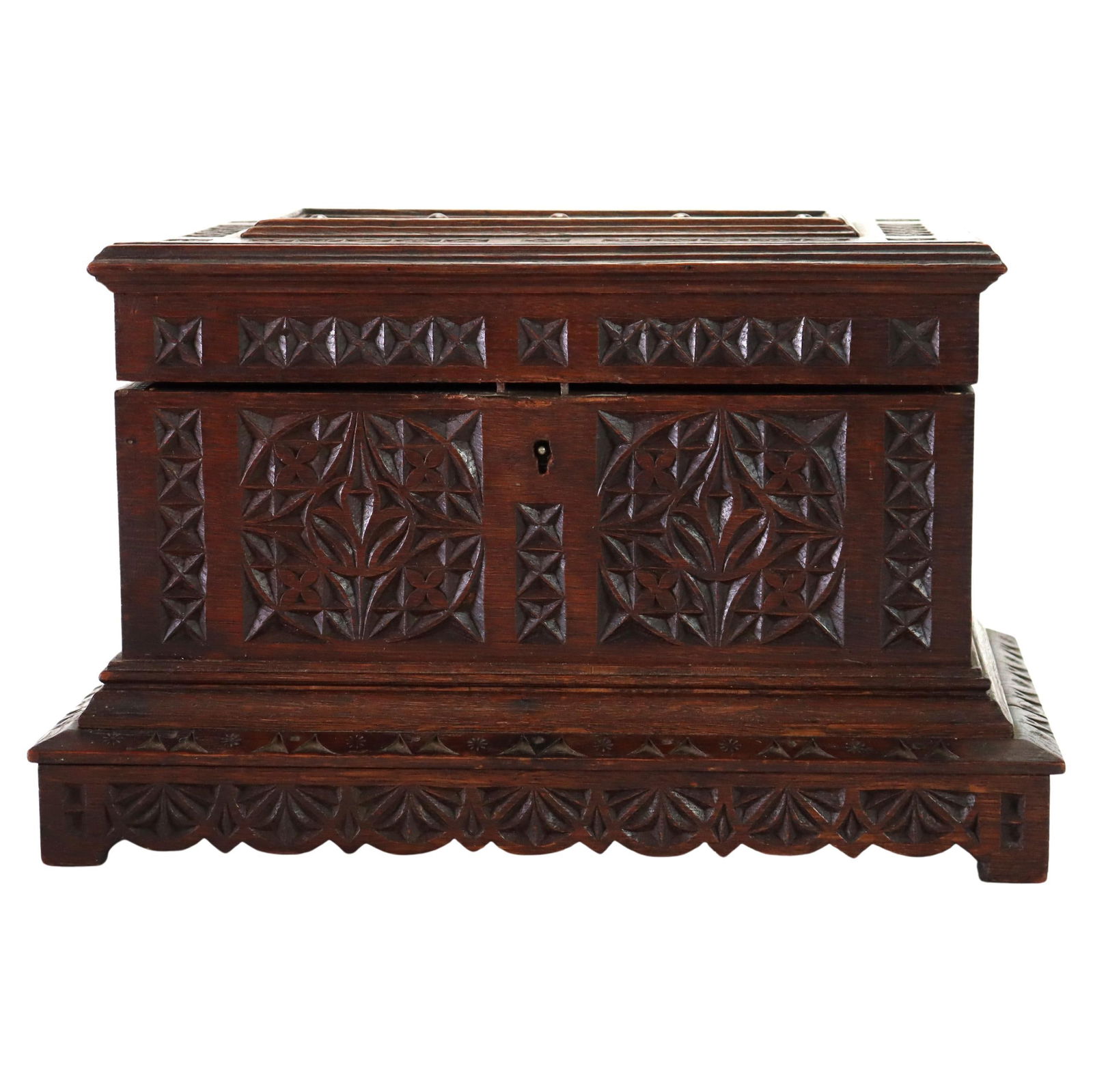 Gothic Revival Walnut Chip Carved Keepsake Box Circa 1860: Gothic Revival Walnut Chip Carved Keepsake Box Circa 1860 This antique keepsake box, dating to circa 1860, is crafted from rich walnut and features detailed chip carving in the Gothic style. The box s