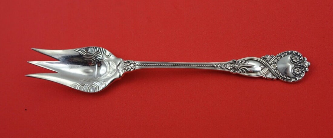 Tiffany & Co. Saint James Sterling Silver Terrapin Fork 5 3/4": Tiffany & Co. Saint James Sterling Silver Terrapin Fork 5 3/4" This exquisite sterling silver terrapin fork from the renowned Saint James pattern by Tiffany & Co. is a remarkable piece of culinary ele