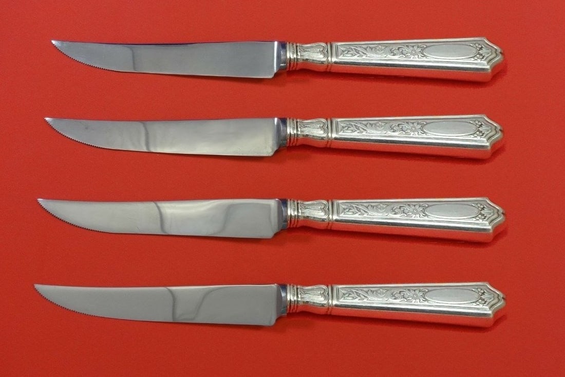 Gorham Saint Dunstan Sterling Silver Steak Knife Set 4pc Custom: Gorham Saint Dunstan Sterling Silver Steak Knife Set 4pc Custom Enhance your dining experience with this exquisite 4-piece Steak Knife Set from Gorham, featuring the elegant Saint Dunstan chased desig
