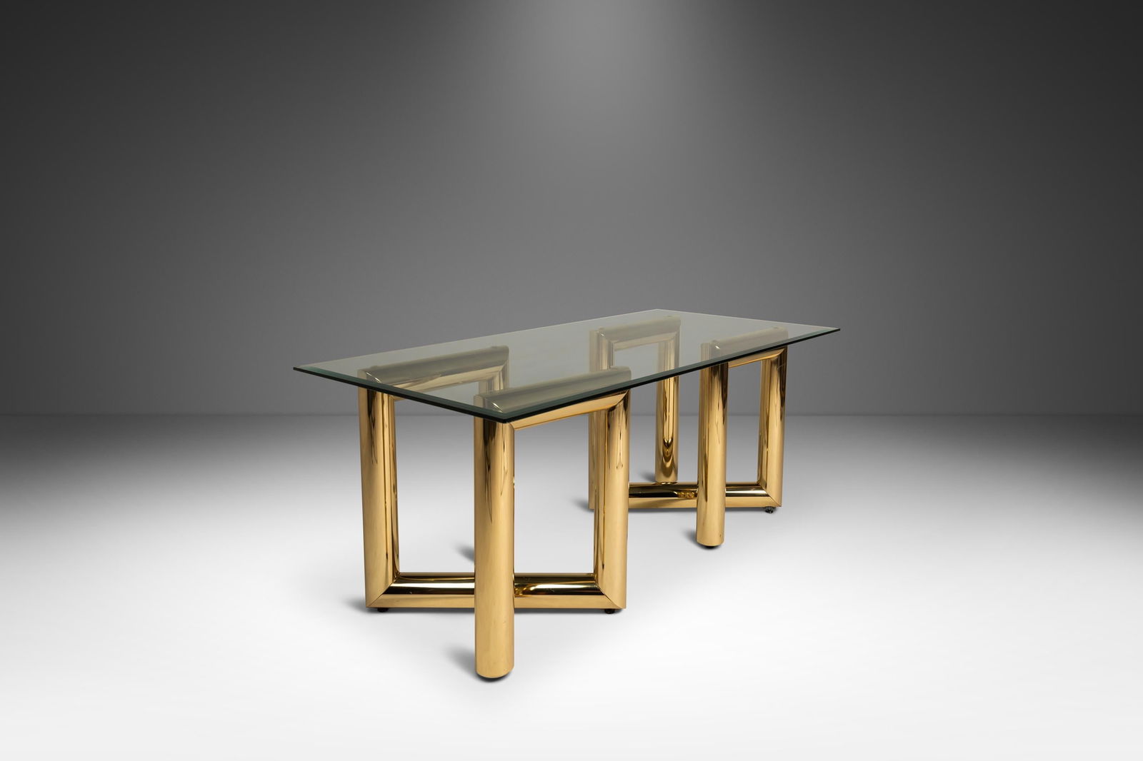 Mid-Century Modern Brass Tubular Z Table Set by Karl Springer 1970s: Mid-Century Modern Brass Tubular Z Table Set by Karl Springer 1970s This exquisite set of two tubular "Z" tables, attributed to the renowned designer Karl Springer, embodies the bold style of 1970s Am
