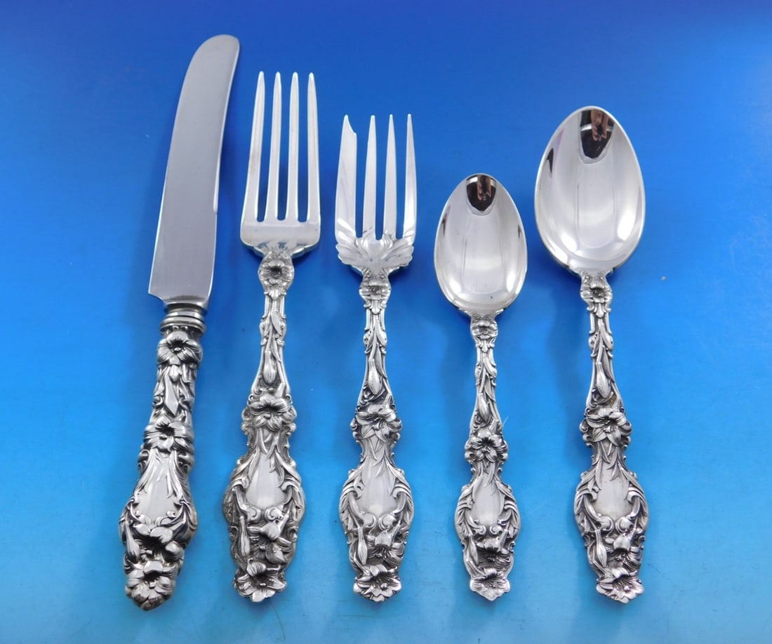 Gorham Whiting Lily Sterling Silver Flatware Set 60 pcs for 12 Service: Gorham Whiting Lily Sterling Silver Flatware Set 60 pcs for 12 Service This exquisite Lily by Gorham (Whiting) sterling silver flatware set is an elegant addition to any dining experience. Featuring a