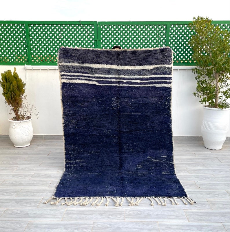 Authentic Handmade Dark Blue Moroccan Berber Wool Rug 10 x 5 Feet: Authentic Handmade Dark Blue Moroccan Berber Wool Rug 10 x 5 Feet Enhance your space with this Elegant Authentic Dark Blue Handmade Moroccan Berber Wool Rug. Handwoven by skilled Berber women weavers