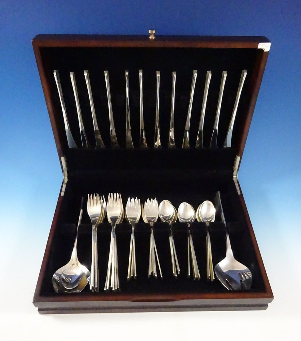 Vision International Sterling Silver Flatware Set 52 Pieces Mid-Century Modern: Vision International Sterling Silver Flatware Set 52 Pieces Mid-Century Modern Elevate your dining experience with this exquisite Vision International Sterling Silver Flatware Set, designed by Ronald
