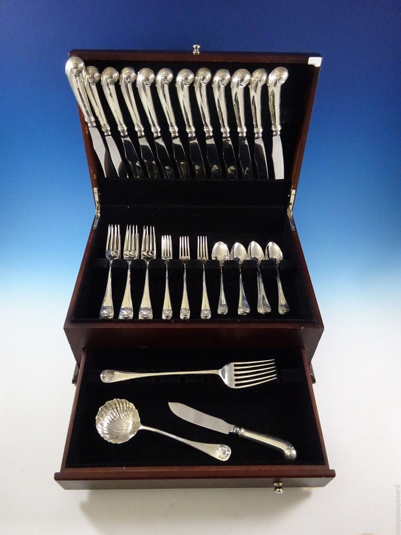 Stieff Williamsburg Shell Sterling Silver 51 Piece Flatware Set: Stieff Williamsburg Shell Sterling Silver 51 Piece Flatware Set Elevate your dining experience with this exquisite Williamsburg Shell by Stieff Sterling Silver Dinner Flatware Set, comprising 51 piece