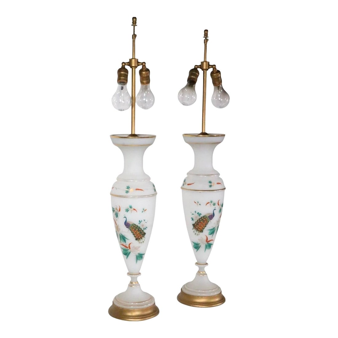 Charming Pair of Hand Painted Peacock Bristol Glass Lamps: Charming Pair of Hand Painted Peacock Bristol Glass Lamps This pair of exceptional Bristol Glass table lamps showcases a stunning hand-painted peacock motif complemented by intricate foliate designs.