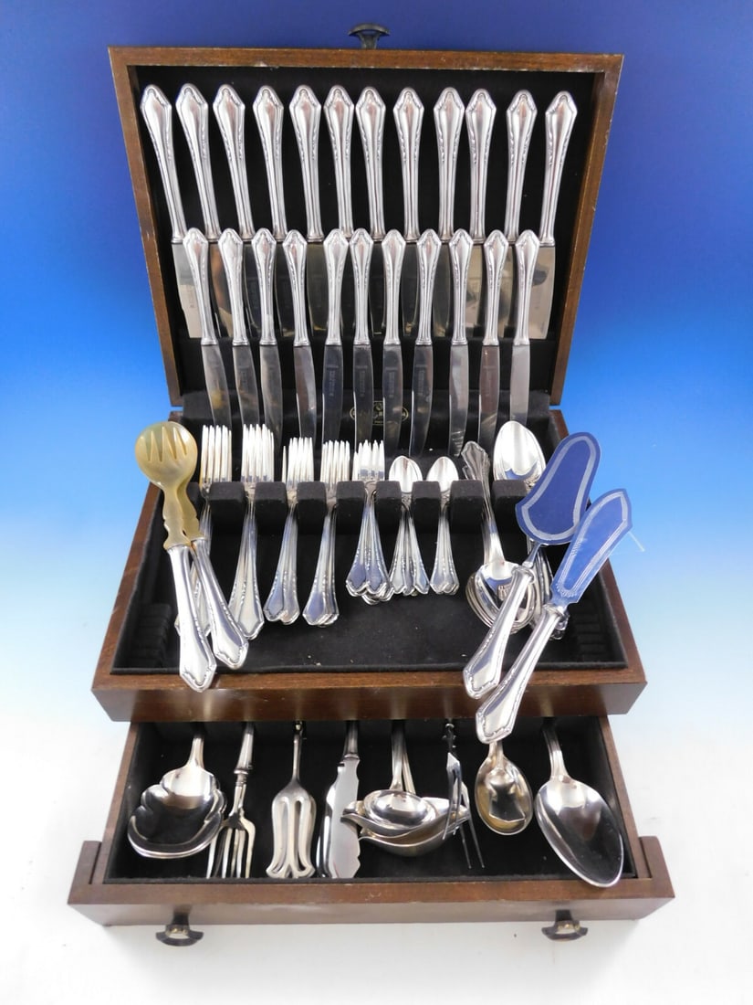 Carl Eickhorn Solingen 102 pc German Silverplated Flatware Set with Storage Chest: Carl Eickhorn Solingen 102 pc German Silverplated Flatware Set with Storage Chest This monumental flatware set, crafted by Carl Eickhorn Solingen, features an impressive 102 pieces made from high-qual