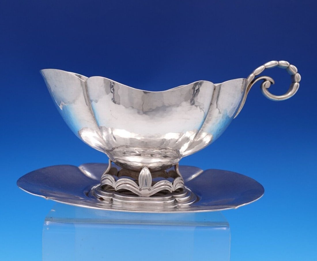 Handmade Sterling Silver Gravy Boat and Underplate Schwanke-Kasten Co: Handmade Sterling Silver Gravy Boat and Underplate Schwanke-Kasten Co This exquisite gravy boat and underplate set is crafted from high-quality sterling silver (.925). Handmade and retailed by Schwank