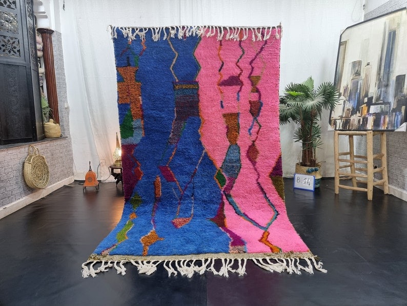 Authentic Handmade Moroccan Berber Wool Rug 10 x 5 Feet: Authentic Handmade Moroccan Berber Wool Rug 10 x 5 Feet Discover the beauty of this Authentic Colorful Handmade Moroccan Berber Wool Rug, meticulously handwoven by local Berber women weavers in the Mi