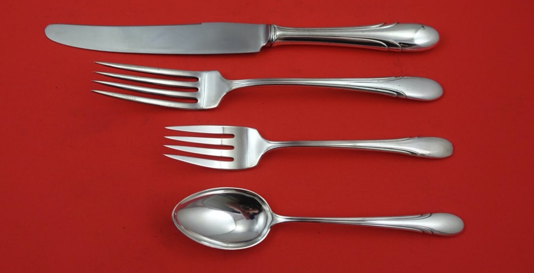 Towle Symphony Sterling Silver 4-Piece Dinner Set: Towle Symphony Sterling Silver 4-Piece Dinner Set This exquisite 4-piece dinner setting from the Symphony pattern by Towle is crafted from high-quality sterling silver. The set features timeless elega