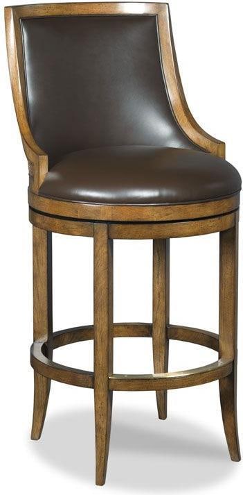 Woodbridge Leather Bar Stool Redding Counter Stool Brass Cocoa Finish: Woodbridge Leather Bar Stool Redding Counter Stool Brass Cocoa Finish Enhance your dining or bar area with the Stylish Woodbridge Leather Bar Stool, designed for comfort and elegance. This stool featu