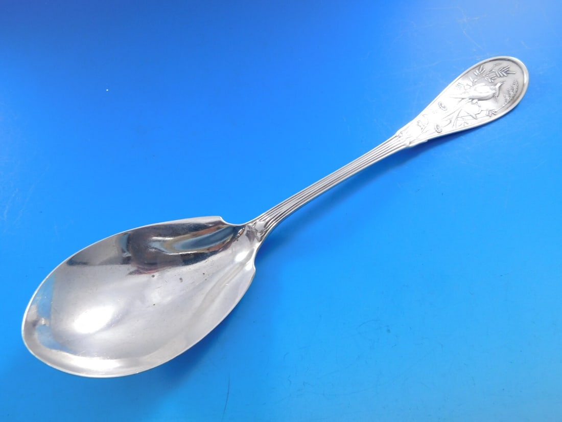 Tiffany & Co Japanese Sterling Silver Berry Spoon 9 1/8 Inch Serving: Tiffany & Co Japanese Sterling Silver Berry Spoon 9 1/8 Inch Serving This exquisite berry spoon from Tiffany & Co. showcases the 'Japanese' pattern, a striking example of the artistry and craftsmanshi