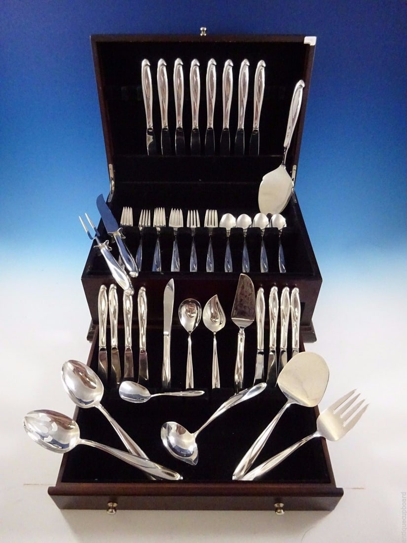 Reed & Barton Silver Sculpture Sterling Silver Flatware Set 53 Pcs: Reed & Barton Silver Sculpture Sterling Silver Flatware Set 53 Pcs This exquisite Sterling Silver Flatware Service set, designed by Robert H. Ramp for Reed & Barton, embodies the fluid beauty of the o