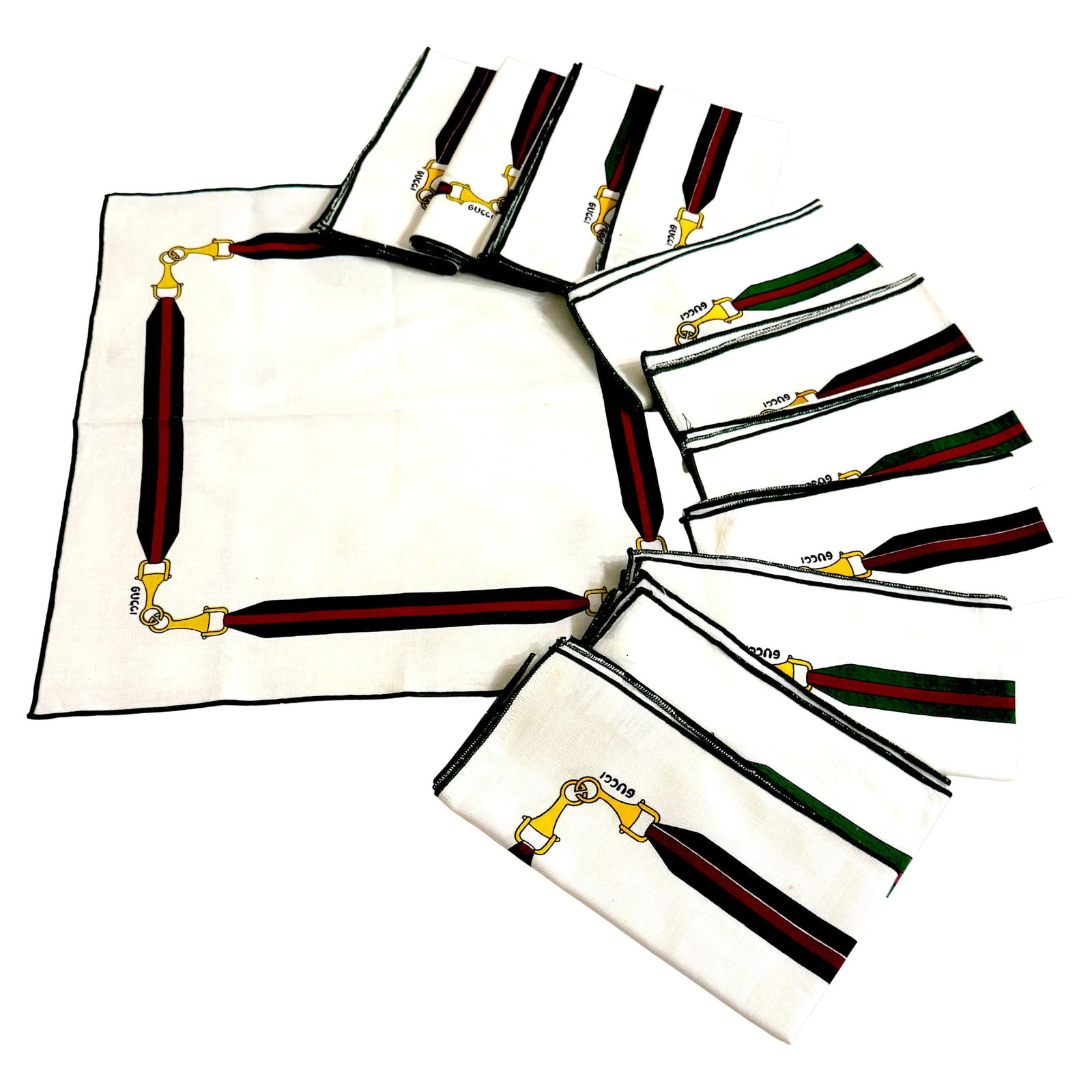 Set of 12 Vintage Gucci Equestrian Napkins with Horsebit Motif 1980s Signed Italy: Set of 12 Vintage Gucci Equestrian Napkins with Horsebit Motif 1980s Signed Italy This exquisite set of twelve vintage napkins, attributed to Aldo Gucci, showcases the iconic equestrian horsebit motif