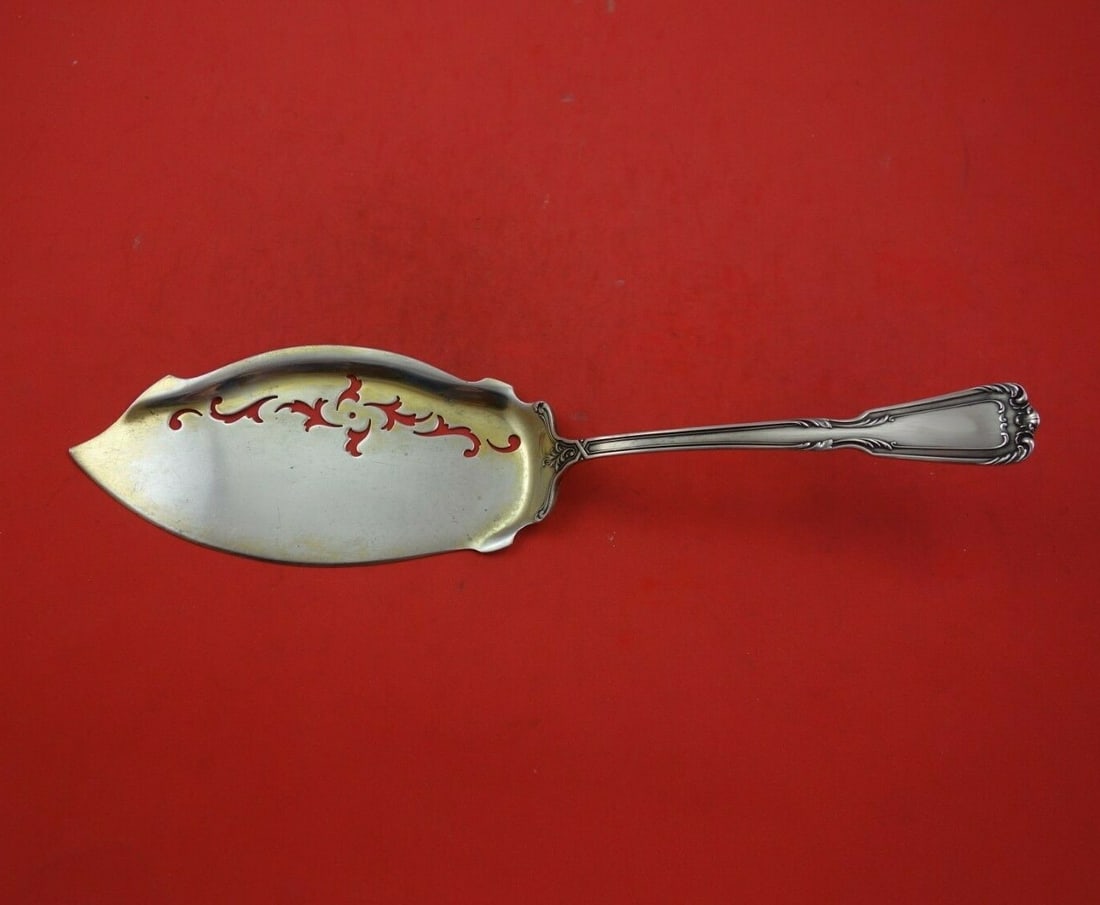 Reed and Barton Chambord Sterling Silver Fish Server 11 1/2": Reed and Barton Chambord Sterling Silver Fish Server 11 1/2" This exquisite fish server from the Chambord pattern by Reed and Barton is a true testament to fine craftsmanship. Made of sterling silver,