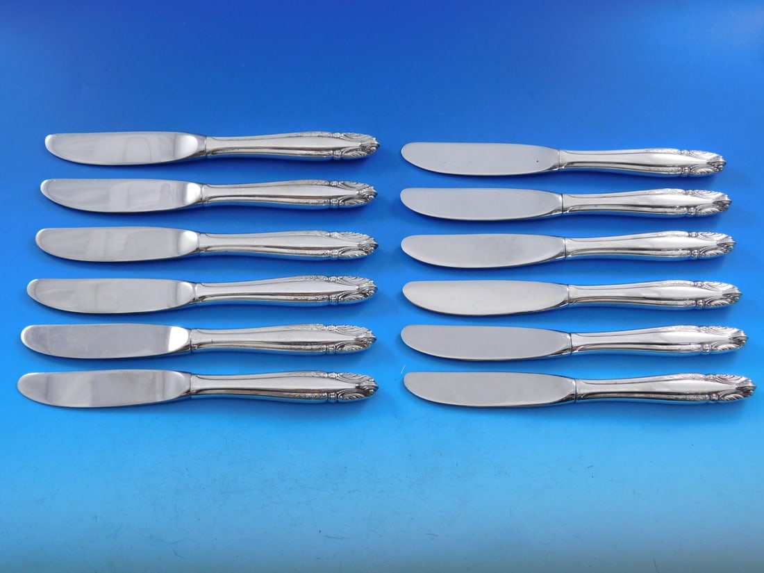 Wallace Stradivari Sterling Silver Butter Spreader Set 12 pcs 6 1/4": Wallace Stradivari Sterling Silver Butter Spreader Set 12 pcs 6 1/4" Enhance your dining experience with this exquisite set of 12 butter spreaders from the Stradivari pattern by Wallace. Each spreader