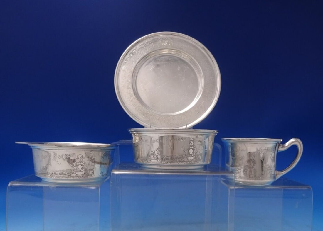 Lebkuecher & Co Sterling Silver Child's Set 4pc Nursery Rhymes: Lebkuecher & Co Sterling Silver Child's Set 4pc Nursery Rhymes This charming four-piece child's set by Lebkuecher & Co. is crafted from high-quality sterling silver (.925) and features delightful acid