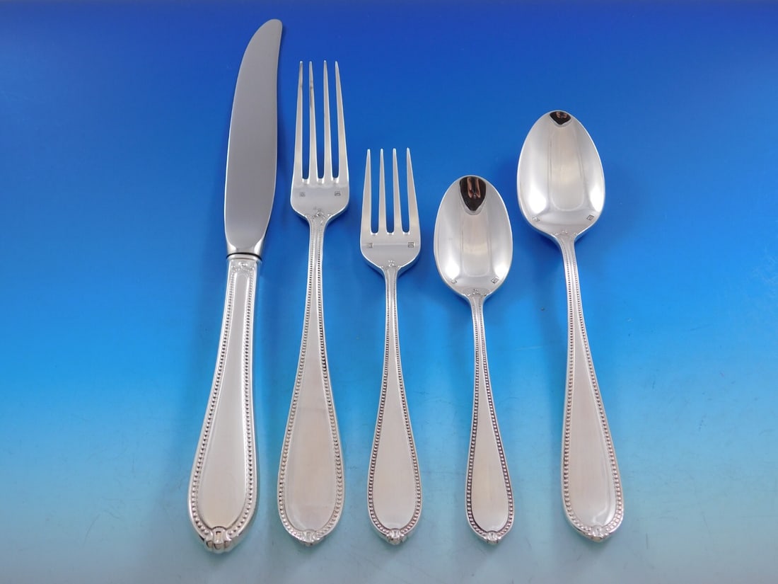 Tuttle Triumph Sterling Silver Flatware Set for 12 65 Pieces: Tuttle Triumph Sterling Silver Flatware Set for 12 65 Pieces Elevate your dining experience with the Triumph by Tuttle Sterling Silver Flatware Set, meticulously crafted for 12. This exquisite set con