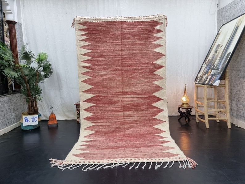 Handmade Moroccan Berber Wool Rug 6.56 x 3.28 Feet: Handmade Moroccan Berber Wool Rug 6.56 x 3.28 Feet Discover the beauty of this Elegant Authentic Handmade Moroccan Berber Wool Rug. Crafted with care by local Berber women weavers in the Atlas Mountai