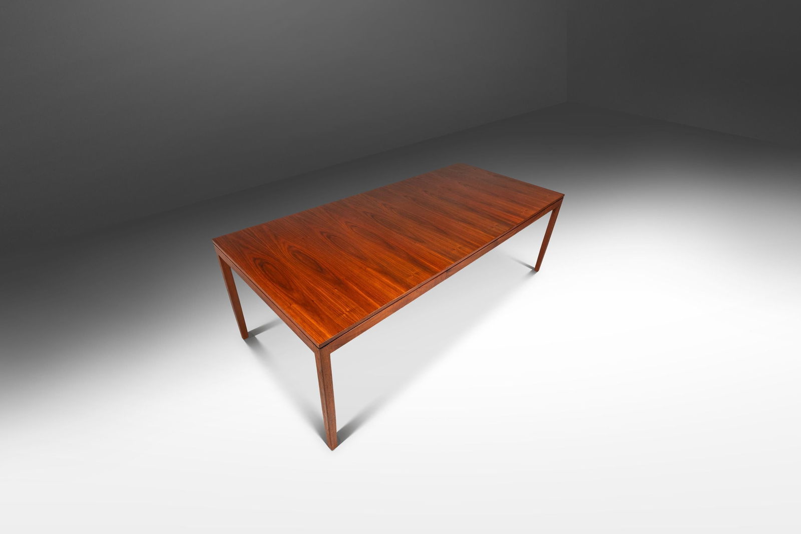 Rare Florence Knoll Model 303 Walnut Expansion Dining Table 1957: Rare Florence Knoll Model 303 Walnut Expansion Dining Table 1957 Experience the elegance of Mid-Century Modern design with this rare Model 303 Expansion Dining Table, crafted from rich walnut and desi