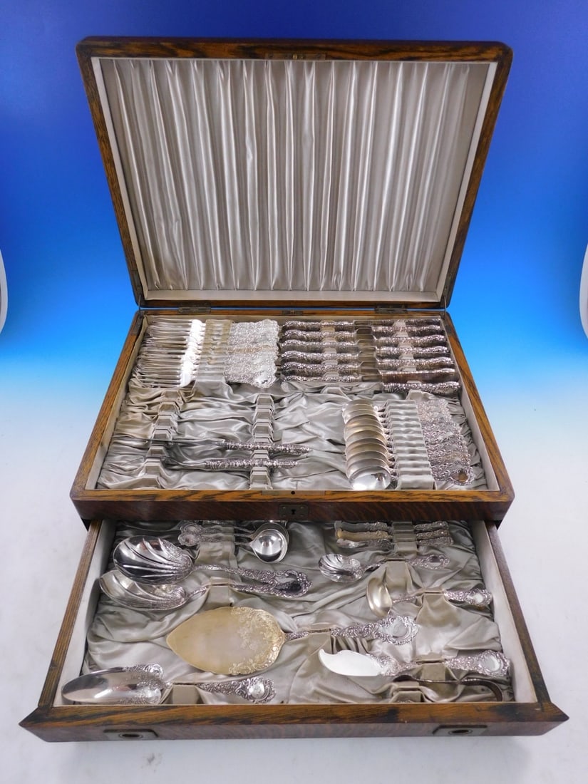 Wallace Louvre Sterling Silver Flatware Set 68 pcs Vintage Chest: Wallace Louvre Sterling Silver Flatware Set 68 pcs Vintage Chest This exquisite Louvre flatware set by Wallace is crafted from sterling silver and showcases the elegance of Baroque and Rococo styles.