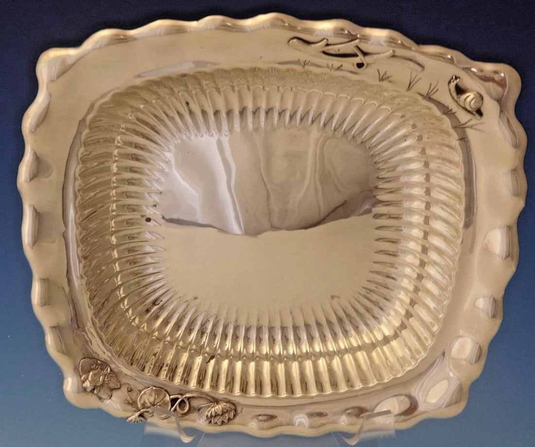 Whiting Sterling Silver Bowl with Frog Snail Branch Lily Pads 1890s: Whiting Sterling Silver Bowl with Frog Snail Branch Lily Pads 1890s This exquisite Whiting sterling silver bowl, crafted between 1850 and 1899, features a stunning ruffled edge and interior fluting. A