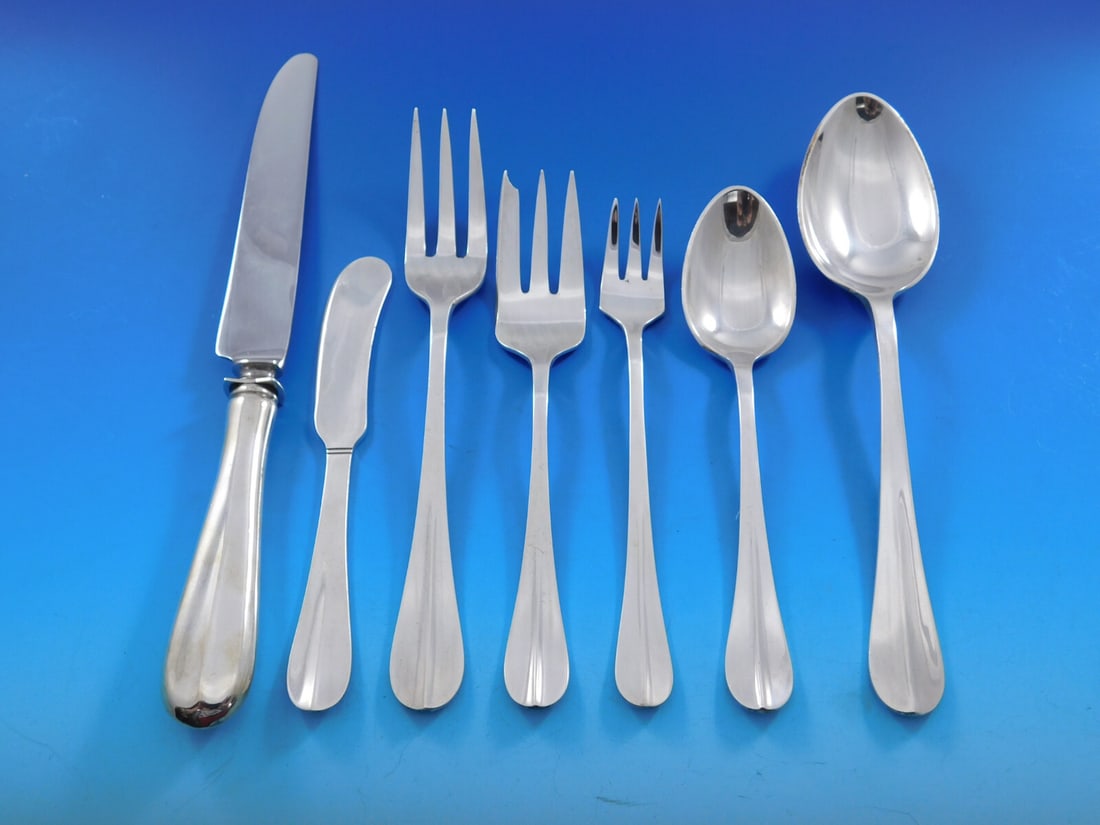 Rare Tuttle Queen Anne Sterling Silver Flatware Set for 12 83pcs with Storage Chest: Rare Tuttle Queen Anne Sterling Silver Flatware Set for 12 83pcs with Storage Chest Discover the exquisite Queen Anne flatware set by Tuttle, composed of sterling silver and featuring a classic design