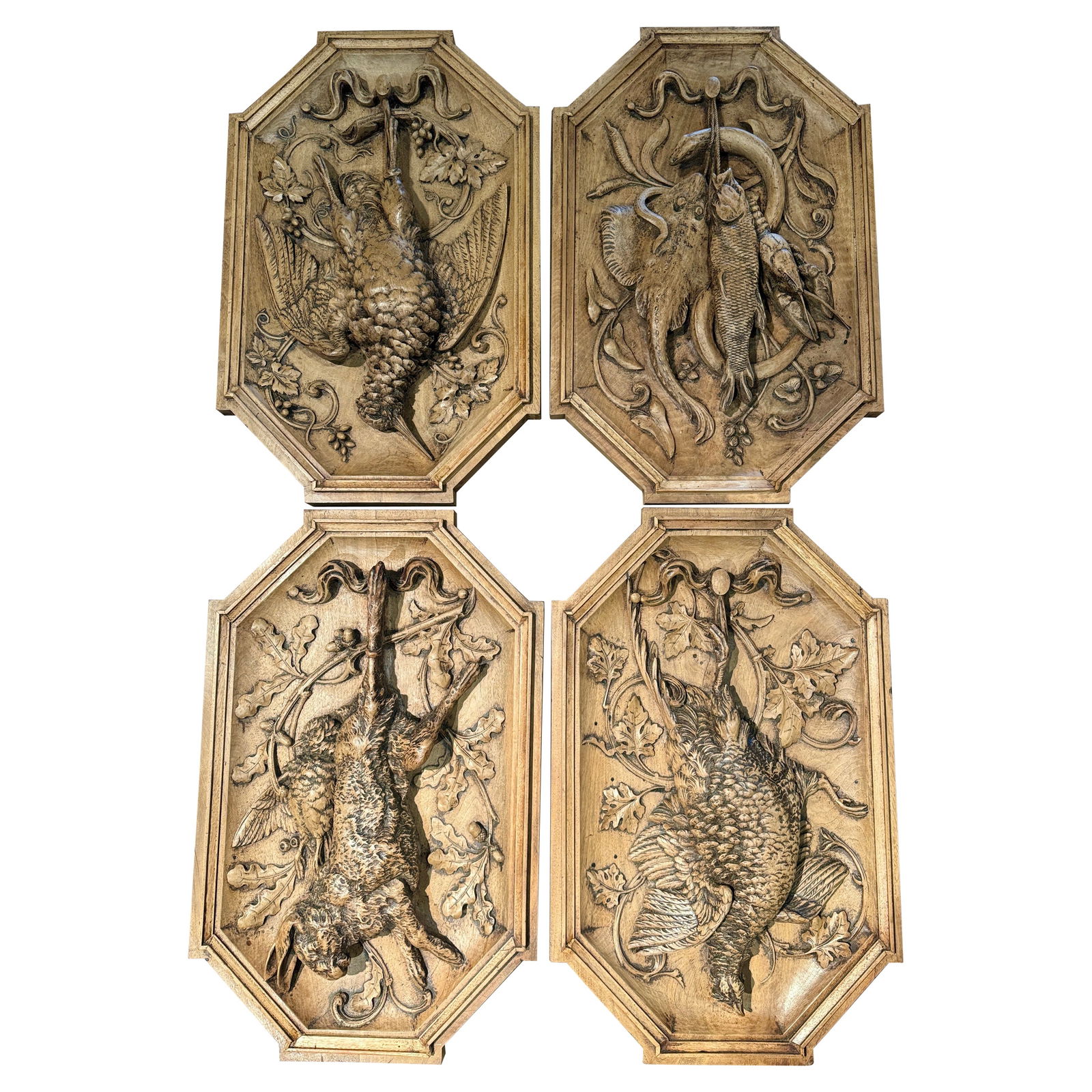 Set of 4 Antique 19th Century Black Forest Carved Hunt Trophies: Set of 4 Antique 19th Century Black Forest Carved Hunt Trophies Enhance your rustic decor with this exquisite set of four 19th Century French Black Forest carved hunt trophies. Crafted in Switzerland