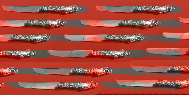 Lily Pattern by Whiting Sterling Silver Steak Knife Set 12 pcs 8 1/2 inch: Lily Pattern by Whiting Sterling Silver Steak Knife Set 12 pcs 8 1/2 inch Enhance your dining experience with this exquisite set of 12 steak knives from the renowned Lily pattern by Whiting. Crafted f